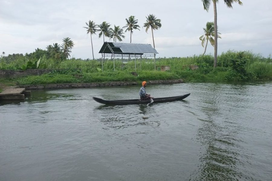 A local Backwater resident heads to the store in his wooden canoe