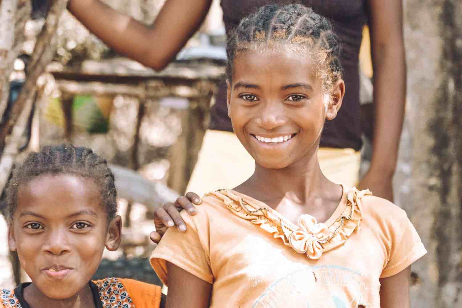 Young Malagasy girls smiling in Tsingy