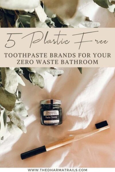 toothpaste in a jar and a bamboo toothbrush with text overlay 5 plastic free toothpaste brands for your zero waste bathroom