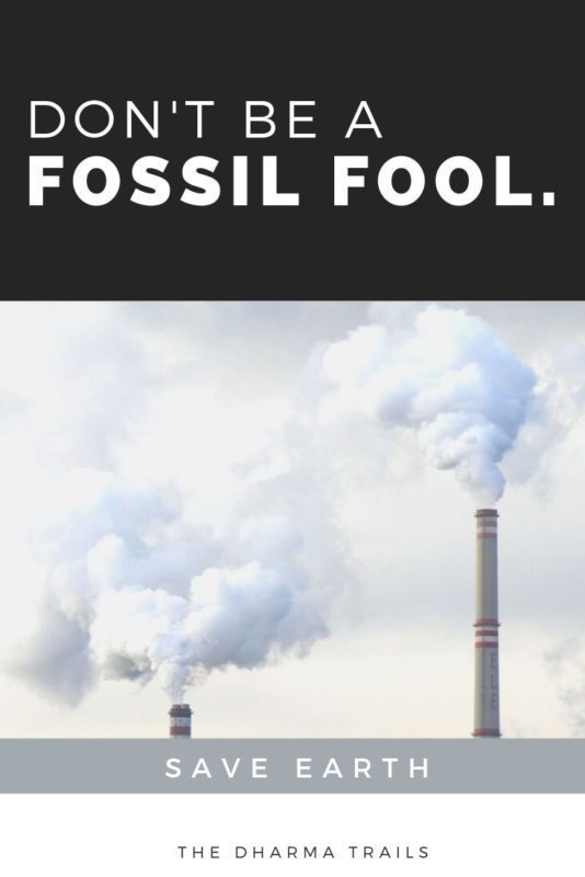 Smoke stack burning fossil fuels with text overlay save earth
