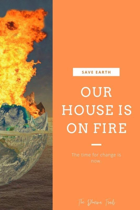 Earth with flames and text overlay our house is on fire. Save earth