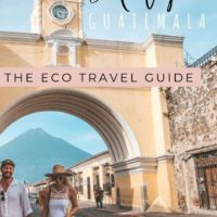 couple at the Arco de cat santarina with text overlay Antigua Guatemala the eco travel guide