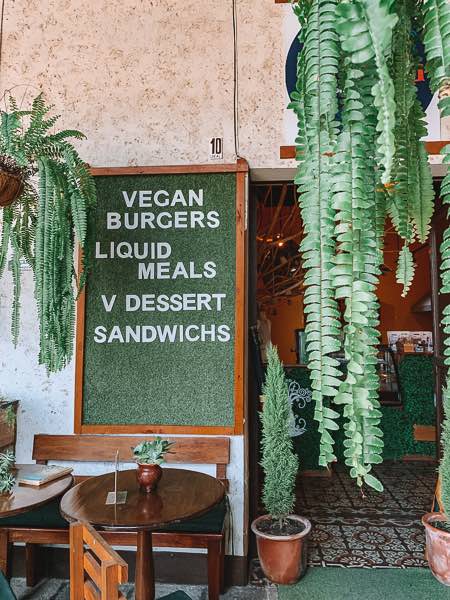vegan restaurant surrounded by plants