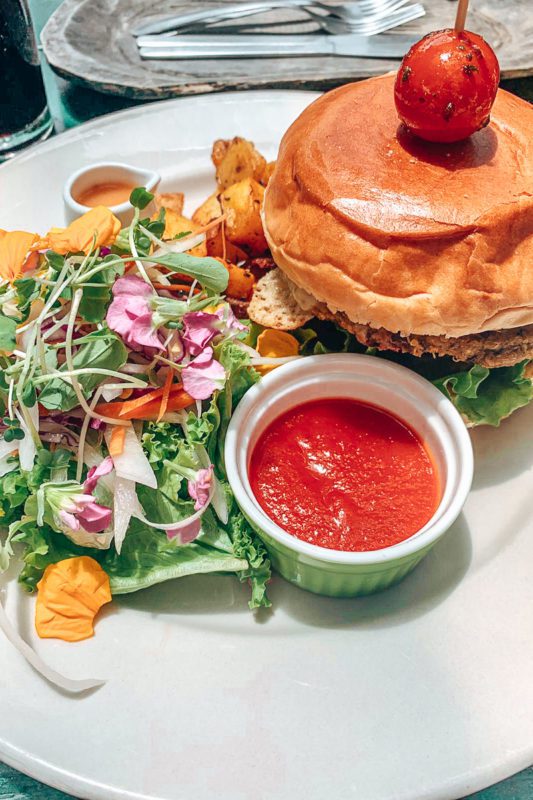 vegan burger and flower salad from caoba farms in antigua guatemala