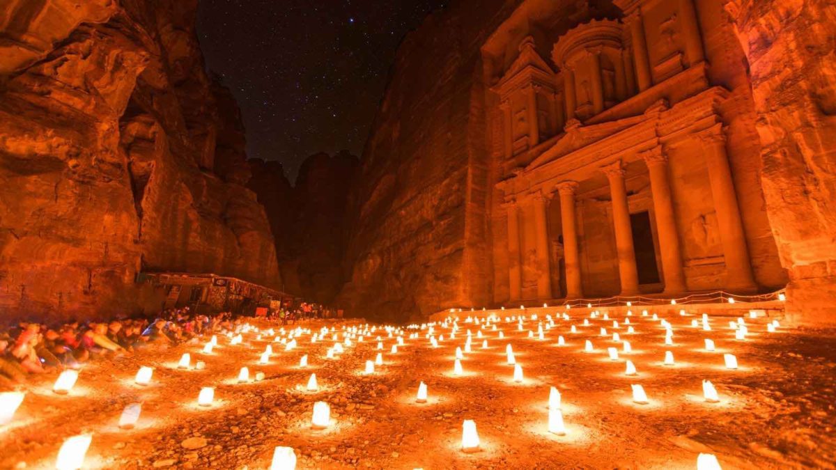 candles and lanterns infront of petra ruins