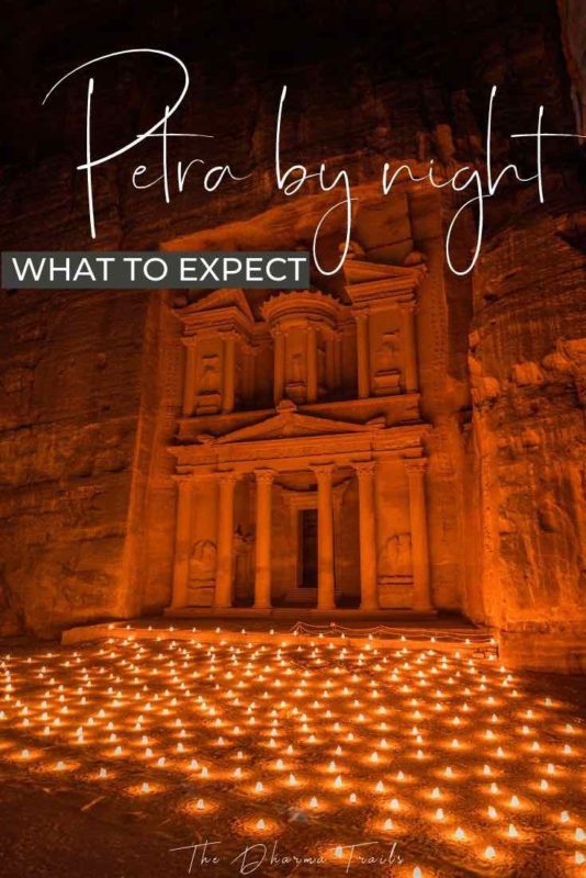 candles infront of petra with text overlay petra by night what to expect