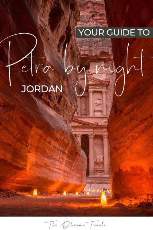 candles infront of petra with text overlay your guide to petra by night jordan