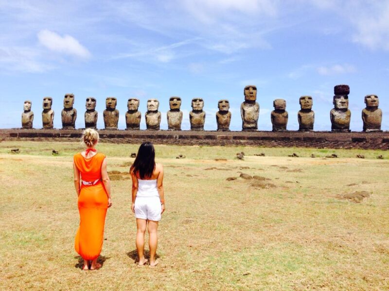 Girls standing infront of the Ahu Tongariki statues