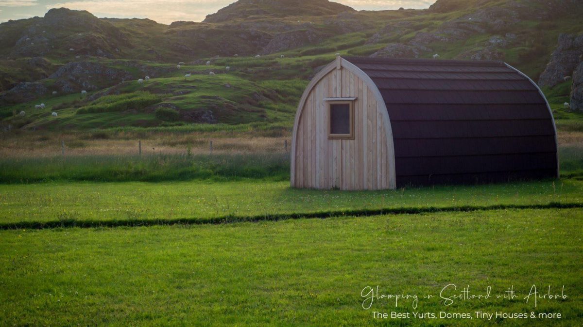 Pod in the countryside with text overlay Glamping in Scotland with Airbnb