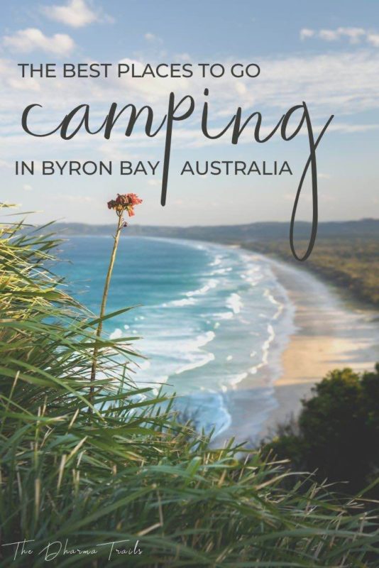 byron bay coastline with text overlay camping in byron bay australia