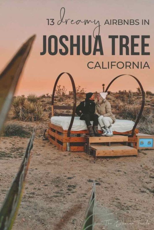 couple in the joshua tree desert with text overlay 13 dreamy airbnbs in joshua tree