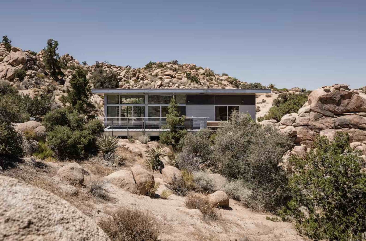 sustainable luxe Joshua Tree home surrounded by boulders 