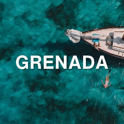 grenada ocean with sailboat